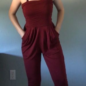 A maroon jumpsuit.